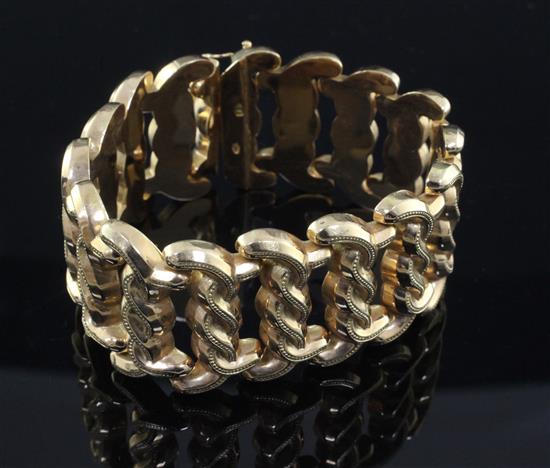 A stylish Italian 18ct gold fancy interwoven style link bracelet, 47 grams.